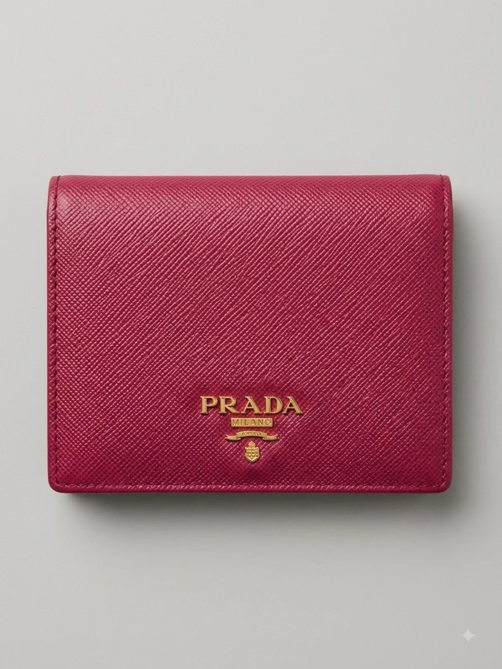 Authentic Prada Saffiano Leather Compact Wallet in deep red/berry/magenta color